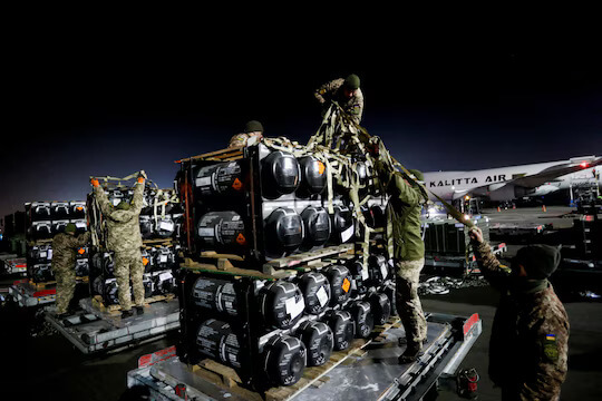 Ukrainian service members unpack Javelin antitank missiles from the United States. Reuters