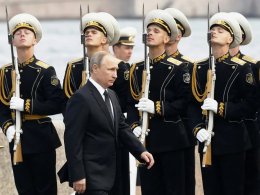 President Vladimir Putin of Russia arriving at the military parade in St. Petersburg during a Navy Day celebration on Sunday. Maxim Shipenkov