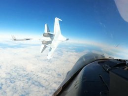 A Russian SU-35 aircraft performs what the U.S. Air Force called a dangerous maneuver directed at a U.S. F-16 over Alaska on Sept. 23. NORAD