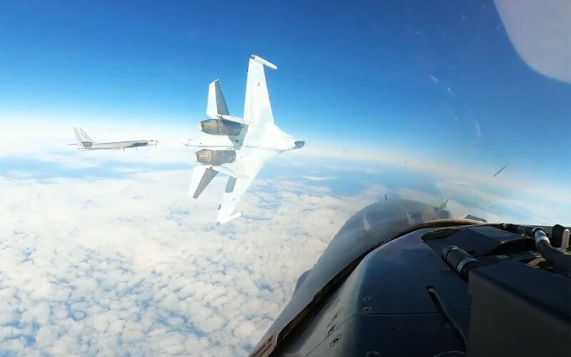 A Russian SU-35 aircraft performs what the U.S. Air Force called a dangerous maneuver directed at a U.S. F-16 over Alaska on Sept. 23. NORAD