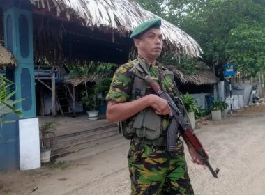 A police officer in Arugam Bay, Sri Lanka. AP