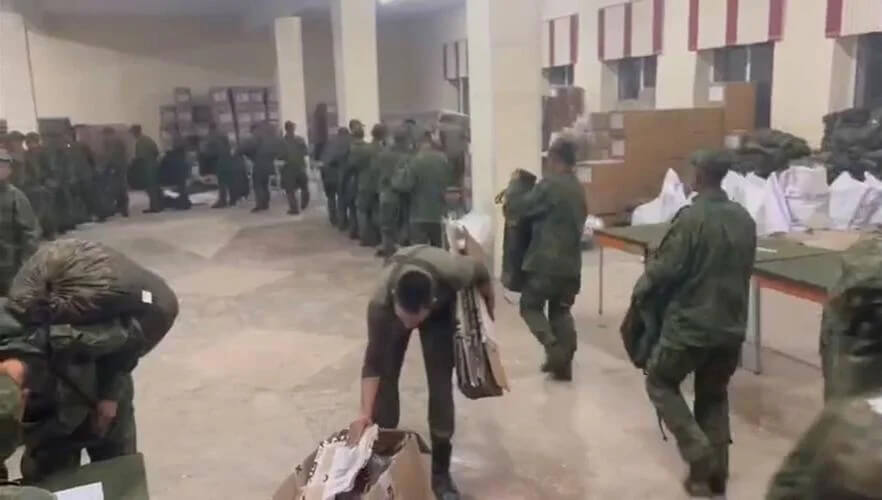 North Korean soldiers purportedly receiving combat apparel for use in Ukraine at the Sergeevsky military base in Russia. Ukranian Center for Strategic Communications and Information Security.