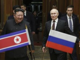 Russian President Vladimir Putin and North Korea's leader Kim Jong Un at the Pyongyang Sunan International Airport outside Pyongyang. Sputnik