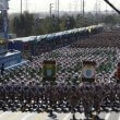 Regime soldiers march in a military parade. AFP