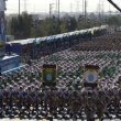 Regime soldiers march in a military parade. AFP