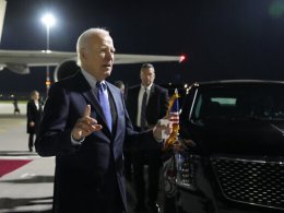 U.S. President Joe Biden speaks after arriving at Brandenburg Airport, October 17, 2024. AP