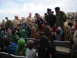 Representative Nancy Pelosi (D-CA) talks to a group of female students at at school near Cop Turbett in Marjah, Helmand Province, Afghanistan, on Sunday, March 20, 2011. Department of State