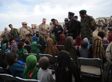 Representative Nancy Pelosi (D-CA) talks to a group of female students at at school near Cop Turbett in Marjah, Helmand Province, Afghanistan, on Sunday, March 20, 2011. Department of State