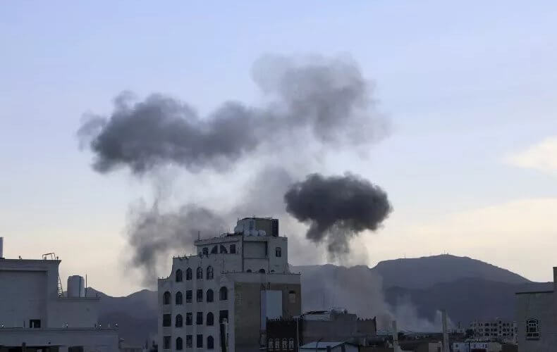 Smokes raise after U.S. aircraft and ships struck Houthi strongholds in Yemen, on October 4. AP