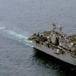 A landing craft approaches the amphibious assault ship USS Boxer for docking. U.S. Navy photo