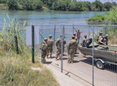 Members of the Texas National Guard erecting razor wire barriers on state land in Eagle Pass, Texas. x.com