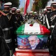 Military personnel stand near the coffin of Mohsen Fakhrizadeh during his funeral in Tehran. AP