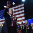 Republican presidential nominee former President Donald Trump and former first lady Melania Trump walk on stage at an election night watch party at the Palm Beach Convention Center. AP