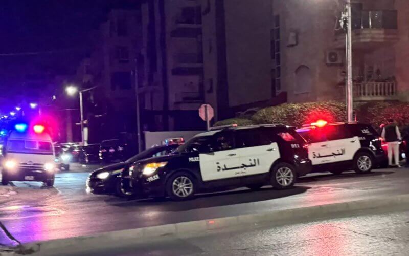 Police vehicles are stationed on a street near the Israeli embassy in Amman, Jordan, on 24 November 2024. Reuters