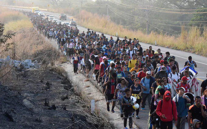 Migrants walking north through Mexico headed for the US Border. AP