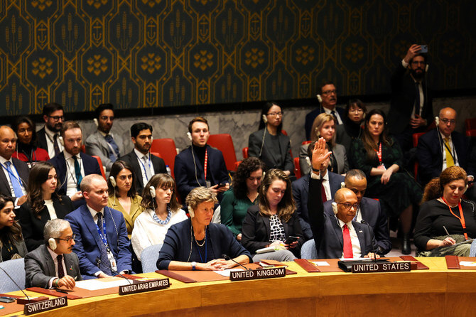 Deputy U.S. Ambassador Robert Wood raises his hand to veto a resolution calling for a ceasefire in Gaza. AFP