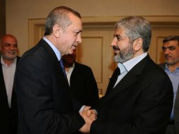 Turkish President Recep Erdogan and Hamas official Khaled Meshaal. Turkish Prime Minister's Office