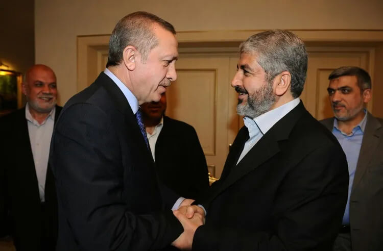 Turkish President Recep Erdogan and Hamas official Khaled Meshaal. Turkish Prime Minister's Office