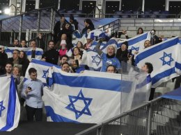 Supporters of the Israeli national team watch a Nations Leage match against France on Thursday. AP