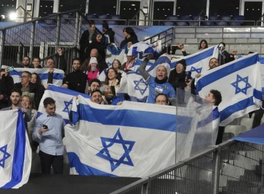 Supporters of the Israeli national team watch a Nations Leage match against France on Thursday. AP