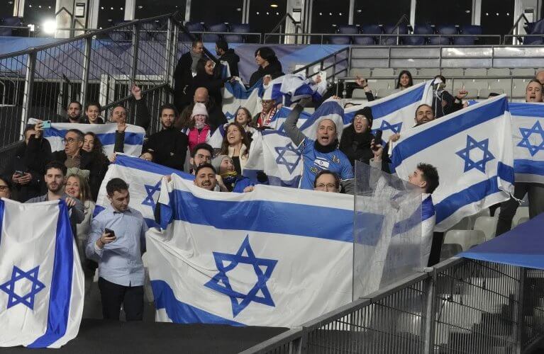 Supporters of the Israeli national team watch a Nations Leage match against France on Thursday. AP