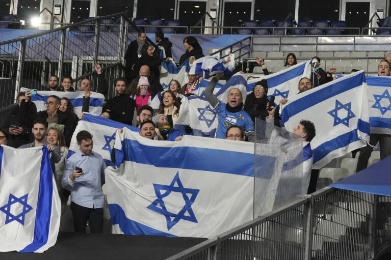 Supporters of the Israeli national team watch a Nations Leage match against France on Thursday. AP