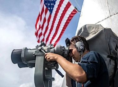 Seaman Caleb Alba conducts watch stander duties aboard the guided-missile destroyer USS Halsey in the South China Sea. U.S. Navy