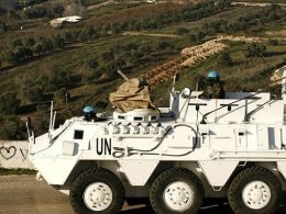 A UNIFIL peacekeeper drives an armored vehicle in Lebanon. AFP