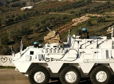 A UNIFIL peacekeeper drives an armored vehicle in Lebanon. AFP