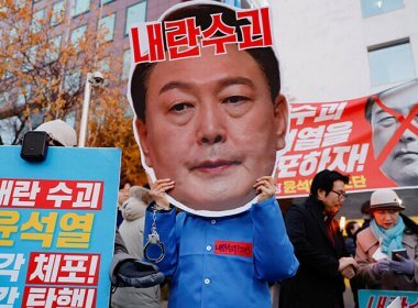 A protestor at a rally calling for the impeachment of South Korean President Yoon Suk Yeol. Reuters