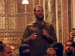 Abu Mohammad al-Golani at a Mosque in Damascus. AP