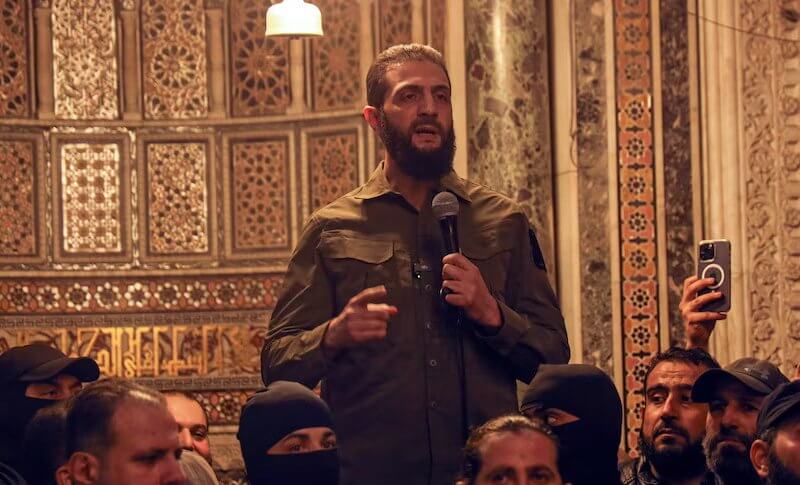 Abu Mohammad al-Golani at a Mosque in Damascus. AP