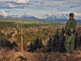 A Border Patrol agent standing watch at the Montana-Canada border in the CBP Spokane Sector. The Spokane Sector covers the U.S.-Canada border along the northwestern section of Montana, part of Idaho, and the eastern part of Washington. U.S. Customs and Border Protection