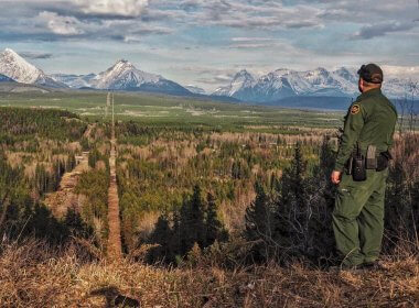 A Border Patrol agent standing watch at the Montana-Canada border in the CBP Spokane Sector. The Spokane Sector covers the U.S.-Canada border along the northwestern section of Montana, part of Idaho, and the eastern part of Washington. U.S. Customs and Border Protection