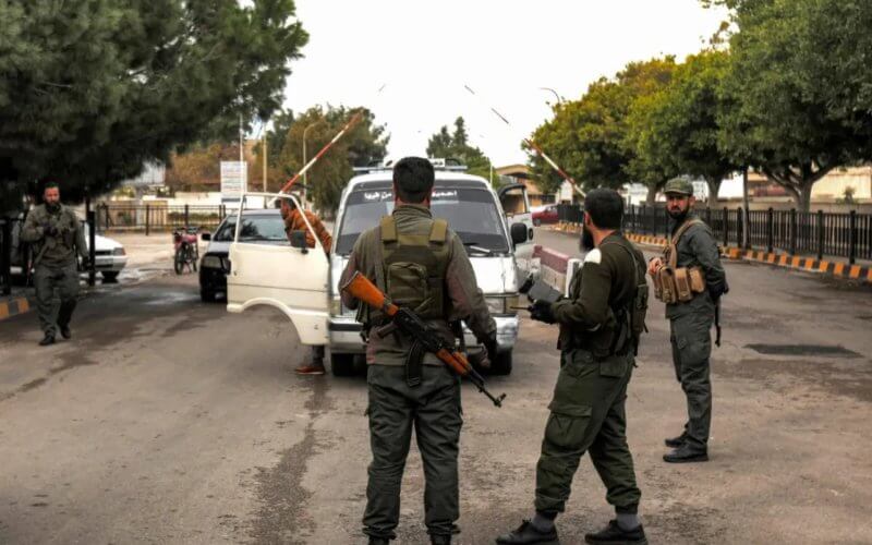 Syrian security personnel in Tartus. AFP