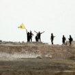 Kurdish militia fighters near Tal Abyad. AP