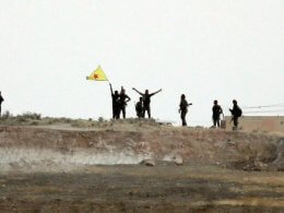 Kurdish militia fighters near Tal Abyad. AP