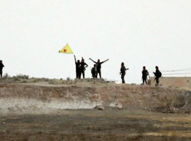 Kurdish militia fighters near Tal Abyad. AP