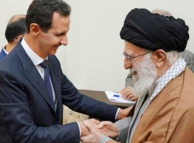 Syrian President Bashar al-Assad shakes hands with the Islamic Republic's Supreme Leader Ali Khamenei. SANA