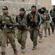 Syrian rebels march in al-Bab. Reuters