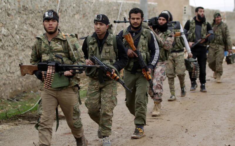 Syrian rebels march in al-Bab. Reuters