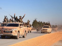 Rebel fighters in the eastern part of Aleppo province. AFP