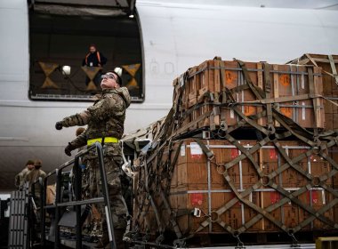 An airman with the 436th Aerial Port Squadron loads cargo during a Ukraine security assistance mission at Dover AFB. U.S. Air Force