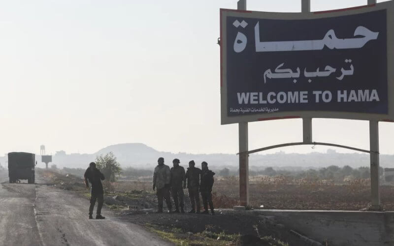 Syrian opposition fighters in the outskirts of Hama. AP