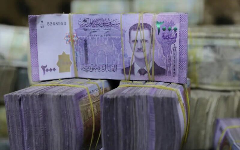 Syrian pounds are pictured inside an exchange currency shop in Azaz, Syria. Reuters