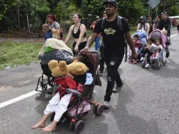 Migrants walk through Tapachula, Chiapas state, Mexico, Nov. 20, 2024. AP