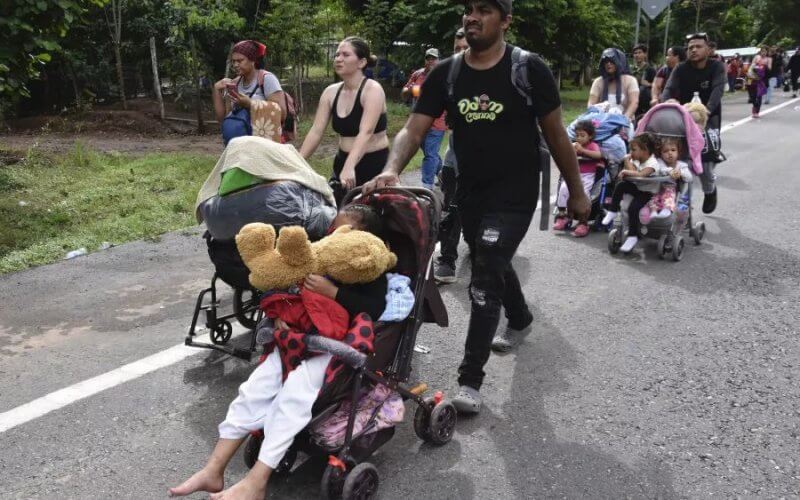 Migrants walk through Tapachula, Chiapas state, Mexico, Nov. 20, 2024. AP