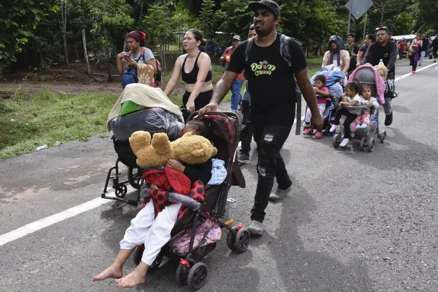 Migrants walk through Tapachula, Chiapas state, Mexico, Nov. 20, 2024. AP