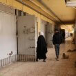 Syrians walking through the halls of the Sednaya prison. news.sky.com