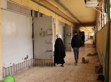 Syrians walking through the halls of the Sednaya prison. news.sky.com